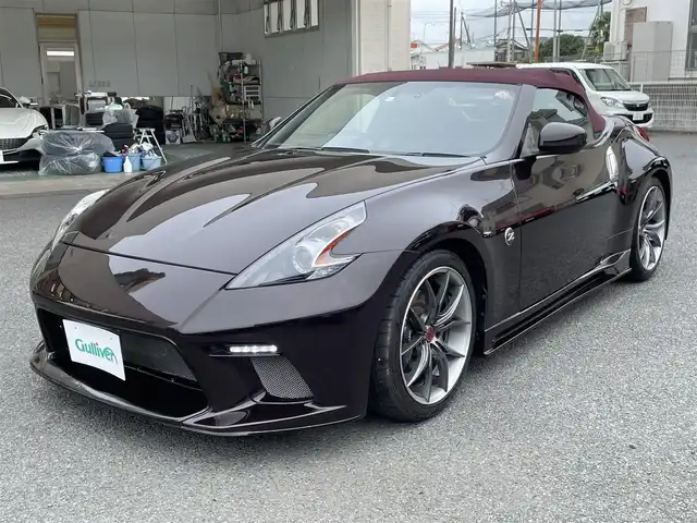 日産 フェアレディ Ｚ ロードスター バージョンST 神奈川県 2009(平21)年 3.5万km プレミアムディープマルーン 社外エアロ(F/S/R)/RAYS19インチAW/紫革シート/純正HDDナビ・地デジTV/純正CD/DVD/MSV/BT再生/バックモニター/ビルトインETC/360°ドライブレコーダー/前席パワーシート/シートヒーター/エアシート/電動オープン/HIDライト/ステアリングスイッチ/電格ミラー/パドルシフト/プッシュスタート/インテリキー×2/H22/23/24/25/26/28/30/R4/5年整備記録/保証書・取説あり