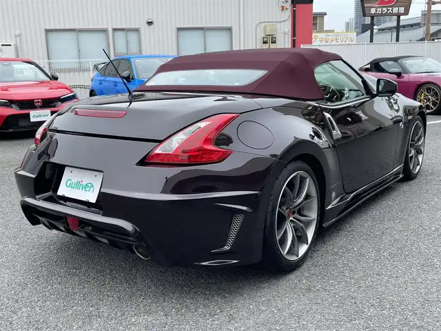 日産 フェアレディ Ｚ ロードスター バージョンST 神奈川県 2009(平21)年 3.5万km プレミアムディープマルーン 社外エアロ(F/S/R)/RAYS19インチAW/紫革シート/純正HDDナビ・地デジTV/純正CD/DVD/MSV/BT再生/バックモニター/ビルトインETC/360°ドライブレコーダー/前席パワーシート/シートヒーター/エアシート/電動オープン/HIDライト/ステアリングスイッチ/電格ミラー/パドルシフト/プッシュスタート/インテリキー×2/H22/23/24/25/26/28/30/R4/5年整備記録/保証書・取説あり