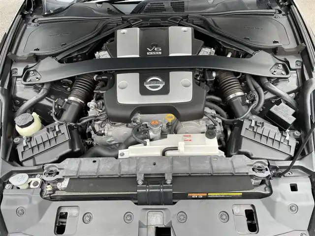 日産 フェアレディ Ｚ ロードスター バージョンST 神奈川県 2009(平21)年 3.5万km プレミアムディープマルーン 社外エアロ(F/S/R)/RAYS19インチAW/紫革シート/純正HDDナビ・地デジTV/純正CD/DVD/MSV/BT再生/バックモニター/ビルトインETC/360°ドライブレコーダー/前席パワーシート/シートヒーター/エアシート/電動オープン/HIDライト/ステアリングスイッチ/電格ミラー/パドルシフト/プッシュスタート/インテリキー×2/H22/23/24/25/26/28/30/R4/5年整備記録/保証書・取説あり