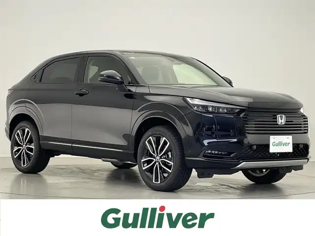 ホンダ ヴェゼル ハイブリッド e:HEV Z 滋賀県 2025(令7)年 0.1万km未満 クリスタルブラックパール 登録済未使用車/純正9インチナビ【Bluetooth/AppleCarPlay/USB】/バックカメラ/シートヒーター/ハーフレザーシート /パワーバックドア/LEDライト/オートライト/ETC2.0/Honda SENSING/レーダークルーズコントロール/レーンキープアシスト/AFS/前後ソナー/ワイヤレス充電/プッシュスタート/スマートキー