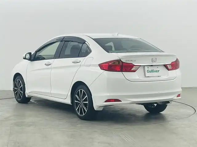 ホンダ グレイス LX 福島県 2015(平27)年 17.5万km ホワイトオーキッドパール 純正ナビ/・型番：VXM-155VSi/・ワンセグTV/BT/CD/DVD/・バックカメラ/・ETC/・ドライブレコーダー/アイドリングストップ/革巻きステアリング/・ステアリングリモコン/プッシュスタート/・スマートキー/・スペアキー/LEDヘッドライト/・オートライト/電動格納ミラー/純正フロアマット/ドアバイザー/保証書
