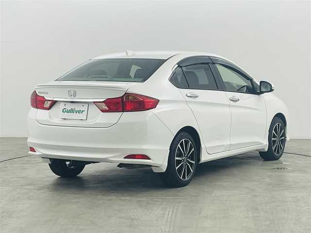 ホンダ グレイス LX 福島県 2015(平27)年 17.5万km ホワイトオーキッドパール 純正ナビ/・型番：VXM-155VSi/・ワンセグTV/BT/CD/DVD/・バックカメラ/・ETC/・ドライブレコーダー/アイドリングストップ/革巻きステアリング/・ステアリングリモコン/プッシュスタート/・スマートキー/・スペアキー/LEDヘッドライト/・オートライト/電動格納ミラー/純正フロアマット/ドアバイザー/保証書