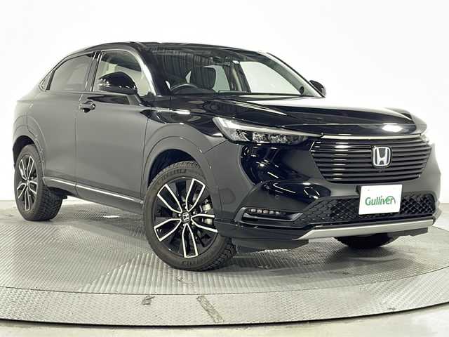 ホンダ ヴェゼル ハイブリッド e:HEV Z 広島県 2022(令4)年 2.9万km クリスタルブラックパール 9型ホンダコネクトディスプレイ/マルチビューカメラ/プレミアムオーディオ/シートヒーター/ハーフレザーシート/パワーテールゲート/ステアリングヒーター/減速セレクター/ヒルディセントコントロール/ホンダセンシング/・衝突軽減ブレーキ/・レーンキープアシスト/・アダプティブクルーズコントロール/・オートハイビーム/・誤発進抑制機能/・パーキングセンサー/LEDヘッドランプ/純正18インチAW/ETC2.0/ワイヤレス充電/ドライブレコーダー