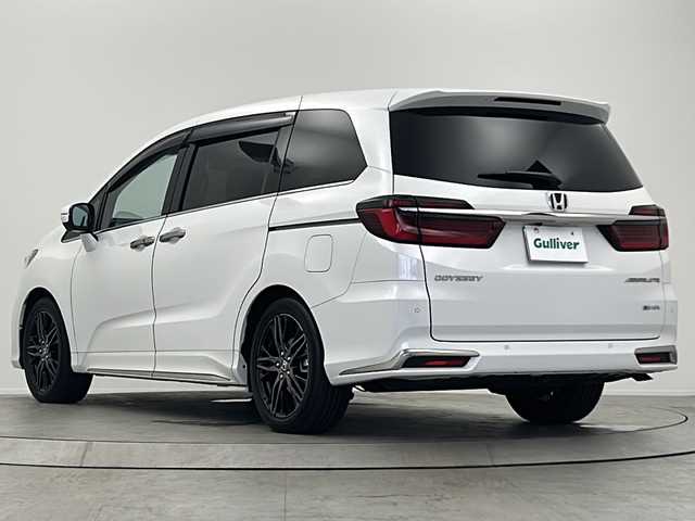 ホンダ オデッセイ ハイブリッド e:HEVアブソルート EX 大阪府 2024(令6)年 1.7万km プラチナホワイトパール 純正メモリナビ/・フルセグTV/・BT　AUDIO/ホンダセンシング/全方位カメラ/両側パワースライドドア/純正フリップダウンモニター/デジタルインナーミラー/ドライブレコーダー/ETC/シートヒーター/パワーシート/クリアランスソナー/LEDヘッドライト
