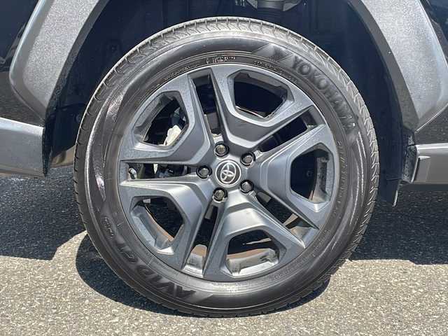 トヨタ ＲＡＶ４ アドベンチャー 福井県 2022(令4)年 2.1万km アティチュードブラックマイカ 登録時走行距離２０４７９ｋｍ/パノラマルーフ/純正ディスプレイオーディオ/JAOSエアロ/（フロント/サイド/リア）/プリクラッシュセーフティ/レーンキープアシスト/アダプティブクルーズコントロール/ブラインドスポットモニター/デジタルインナーミラー/D席パワーシート/（シートメモリ付き）/シートヒーター/エアーシート/ハーフレザーシート/オートトラミラー/オートハイビーム/オートライト/純正１９インチアルミホイール/クリアランスソナー/ルーフレール/LEDヘッドライト/LEDフォグランプ/ステリングヒーター/USBポート/ドライブレコーダー/プッシュスタート/スマートキー/保証書/取扱説明書