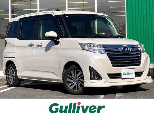 トヨタ ルーミー カスタムG 静岡県 2020(令2)年 5.1万km パールホワイトⅢ 純正ナビ(Cd/DVD/BT/フルセグ)/全方位カメラ/ETC2.0/D席N席シートヒーター/エンジンスタートボタン/両側パワースライドドア/パワーステアリング/パワーウィンドウ/アイドリングストップ/オートエアコン/スマートキー/スペアキー１本/クルーズコントロール/純正フロアマット/ウォークスルー/布シート/純正アルミホイール/ABS/横滑り防止装置/コーナーセンサー前後/レーンキープアシスト/オートライト/オートマチックハイビーム/LEDヘッドライト/Wエアバッグ/衝突軽減システム