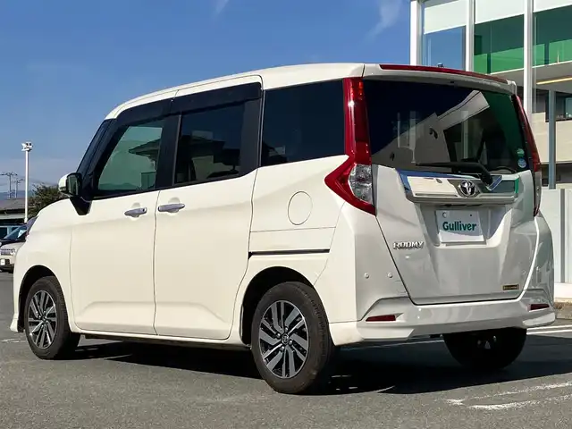 トヨタ ルーミー カスタムG 静岡県 2020(令2)年 5.1万km パールホワイトⅢ 純正ナビ(Cd/DVD/BT/フルセグ)/全方位カメラ/ETC2.0/D席N席シートヒーター/エンジンスタートボタン/両側パワースライドドア/パワーステアリング/パワーウィンドウ/アイドリングストップ/オートエアコン/スマートキー/スペアキー１本/クルーズコントロール/純正フロアマット/ウォークスルー/布シート/純正アルミホイール/ABS/横滑り防止装置/コーナーセンサー前後/レーンキープアシスト/オートライト/オートマチックハイビーム/LEDヘッドライト/Wエアバッグ/衝突軽減システム