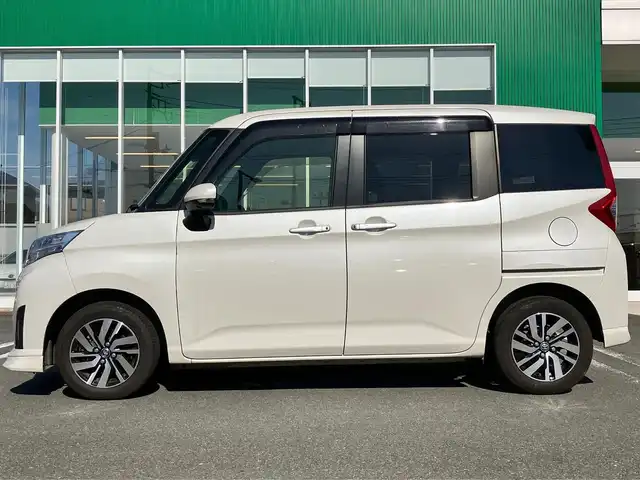 トヨタ ルーミー カスタムG 静岡県 2020(令2)年 5.1万km パールホワイトⅢ 純正ナビ(Cd/DVD/BT/フルセグ)/全方位カメラ/ETC2.0/D席N席シートヒーター/エンジンスタートボタン/両側パワースライドドア/パワーステアリング/パワーウィンドウ/アイドリングストップ/オートエアコン/スマートキー/スペアキー１本/クルーズコントロール/純正フロアマット/ウォークスルー/布シート/純正アルミホイール/ABS/横滑り防止装置/コーナーセンサー前後/レーンキープアシスト/オートライト/オートマチックハイビーム/LEDヘッドライト/Wエアバッグ/衝突軽減システム