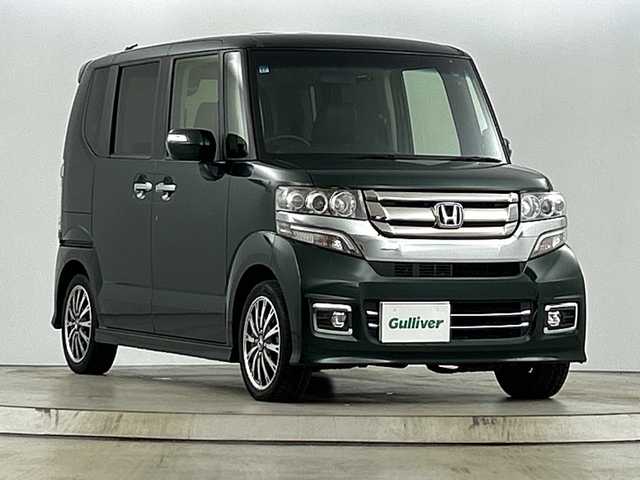 ホンダ Ｎ ＢＯＸ カスタム G ターボ Lパッケージ 愛知県 2015(平27)年 5.6万km ブリティッシュグリーンP 禁煙車/ターボ/純正7インチナビ/（CD/DVD/Bluetooth/フルセグTV/SD)/バックカメラ/ETC/ハーフレザーシート/両側パワースライドドア/パドルシフト/アイドリングストップ/純正15インチアルミホイール/スマートキー/スペアキー1本/プッシュスタート/HIDヘッドライト/フロントフォグライト/純正フロアマット/ベンチシート/チップアップシート/横滑り防止装置