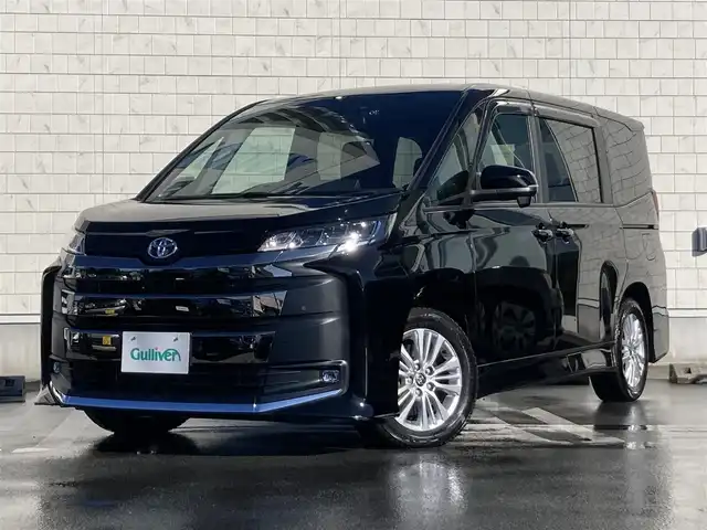 トヨタ ノア S－G 静岡県 2022(令4)年 1.4万km アティチュードブラックマイカ Toyota Safety Sense/純正10.5インチナビ/　AM FM CD DVD Bluetooth USB AppleCarPlay AndroidAuto/フルセグTV/LEDオートヘッドランプ/レーダークルーズコントロール/ハーフレザーシート/前後方クリアランスソナー/両側パワースライドドア/純正16インチアルミホイール/オートブレーキホールド/スマートキー＆プッシュスタート/パーキングアシスト/ビルトインETC2.0/バックモニター/前後方ドライブレコーダー