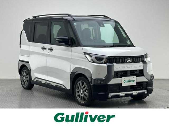 三菱 デリカミニ T プレミアム 兵庫県 2024(令6)年 0.1千km アメジストブラック/シルキーホワイト 登録時走行距離:14km/純正9型ディスプレイオーディオ（AM/FM/BT/USB）/全方位カメラ/デジタルインナーミラー/両側パワースライドドア/ハーフレザーシート/シートヒーター/ハンドルヒーター/衝突被害軽減システム/レーダークルーズコントロール/レーンキープアシスト/コーナーセンサー/横滑り防止装置/アイドリングストップ/ダウンヒルアシストコントロール/サイドデカール/オートLEDライト/純正アルミホイール/オートホールド付電子パーキング/革巻きステアリング/ステアリングスイッチ/スマートキー/スペアキー