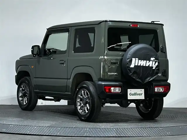 スズキ ジムニー XC 愛媛県 2023(令5)年 0.9万km ジャングルグリーン ワンオーナー　純正SDナビ　Bluetooth　CD　DVD　バックカメラ　スズキセーフティサポート　アイドリングストップ　純正アルミホイール　シートヒーター　ステアリングリモコン　ドアバイザー　プッシュスタート　スマートキー　スペアキー