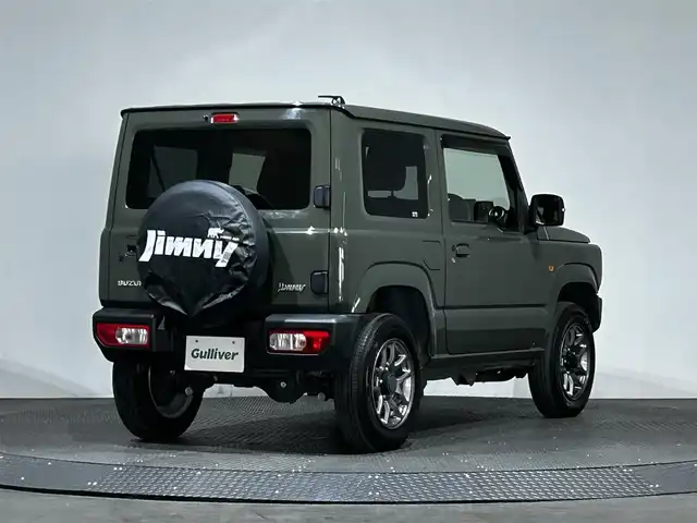 スズキ ジムニー XC 愛媛県 2023(令5)年 0.9万km ジャングルグリーン ワンオーナー　純正SDナビ　Bluetooth　CD　DVD　バックカメラ　スズキセーフティサポート　アイドリングストップ　純正アルミホイール　シートヒーター　ステアリングリモコン　ドアバイザー　プッシュスタート　スマートキー　スペアキー