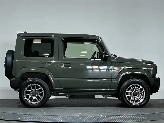スズキ ジムニー XC 愛媛県 2023(令5)年 0.9万km ジャングルグリーン ワンオーナー　純正SDナビ　Bluetooth　CD　DVD　バックカメラ　スズキセーフティサポート　アイドリングストップ　純正アルミホイール　シートヒーター　ステアリングリモコン　ドアバイザー　プッシュスタート　スマートキー　スペアキー
