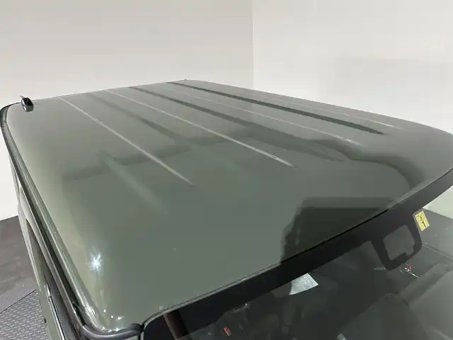 スズキ ジムニー XC 愛媛県 2023(令5)年 0.9万km ジャングルグリーン ワンオーナー　純正SDナビ　Bluetooth　CD　DVD　バックカメラ　スズキセーフティサポート　アイドリングストップ　純正アルミホイール　シートヒーター　ステアリングリモコン　ドアバイザー　プッシュスタート　スマートキー　スペアキー