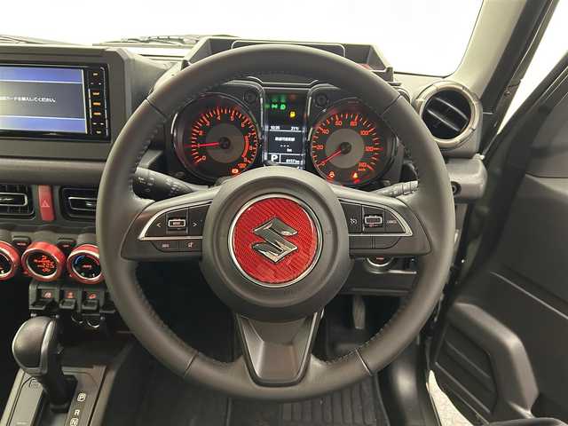 スズキ ジムニー XC 愛媛県 2023(令5)年 0.9万km ジャングルグリーン ワンオーナー　純正SDナビ　Bluetooth　CD　DVD　バックカメラ　スズキセーフティサポート　アイドリングストップ　純正アルミホイール　シートヒーター　ステアリングリモコン　ドアバイザー　プッシュスタート　スマートキー　スペアキー