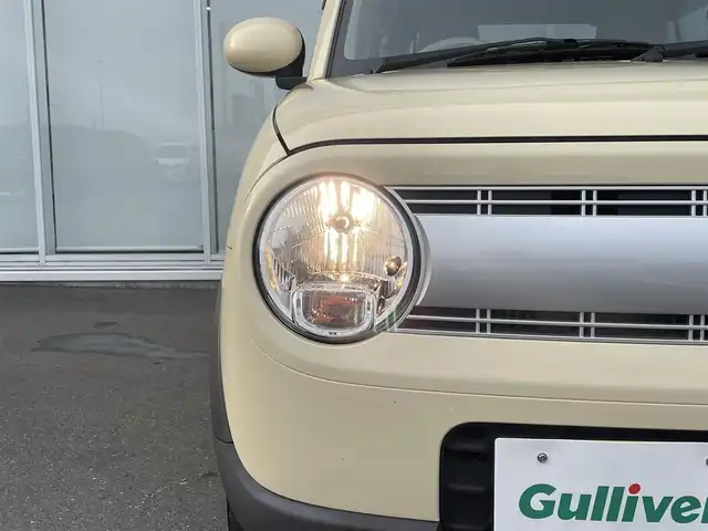 スズキ ラパン G 神奈川県 2021(令3)年 2.5万km シフォンアイボリーM ・社外ＳＤナビ　/・バックカメラ　/・フルセグＴＶ/・Ｂｌｕｅｔｏｏｔｈ　/・ＤＶＤ　ＣＤ　/・シートヒーター（運転席）/・スズキセーフティーサポート　/・コーナーセンサー前後　/・スマートキー　/・プッシュスタート　/・ＵＶカットガラス