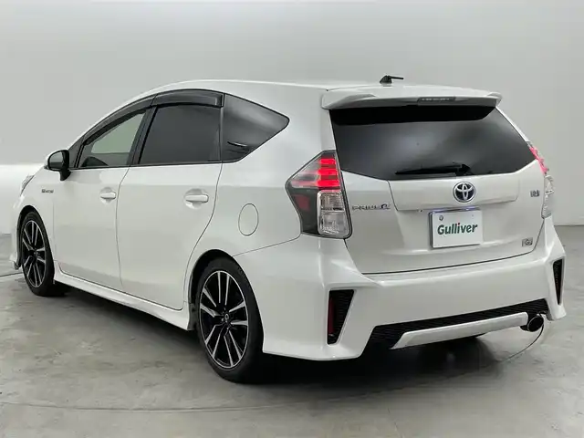 トヨタ プリウス α S ツーリングセレクション G’s 福岡県 2016(平28)年 6.3万km ホワイトパールクリスタルシャイン シルクブレイズエアロ　/後席モニター　/アルパインナビ（ＢＴ，フルセグＴＶ）　/バックカメラ　/ＥＴＣ　/前方ドライブレコーダー　/ハーフレザーシート　/ステアリングリモコン　/純正フロアマット　/純正１８インチＡＷ
