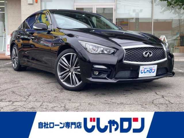 日産 スカイライン 200GT－t タイプSP 静岡県 2014(平26)年 12.3万km ガーネットブラック (株)IDOMが運営する【じしゃロン焼津店】の自社ローン専用車両になります。こちらは現金またはオートローンご利用時の価格です。自社ローンご希望の方は別途その旨お申付け下さい/【じしゃロン個店占有の為　落札禁止】/純正ニッサンコネクトナビ/FM/AM/CD/TV/Bluetooth/Jes TVコントロールSV/アラウンドビューモニター/ETC/コーナーセンサー/クルーズコントロール/本革シート/前席シートヒーター/前席パワーシート/ターボ/LEDヘッドライト/オートライト/プッシュスタート/スマートキー/取説/保証書/記録簿