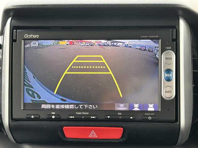 ホンダ Ｎ ＢＯＸ ＋ カスタム G ターボAパッケージ 道東・釧路十勝 2014(平26)年 8.1万km カトラリーシルバーM 4WD/社外SDナビ/革巻きステアリング/プッシュスタート/パワーウィンドウ/アイドリングストップ/パワーステアリング/オートライト/横滑り防止装置/クルーズコントロール/パドルシフト/純正フロアマット/社外14インチアルミホイール/社外スタッドレスタイヤ積込み/取扱説明書