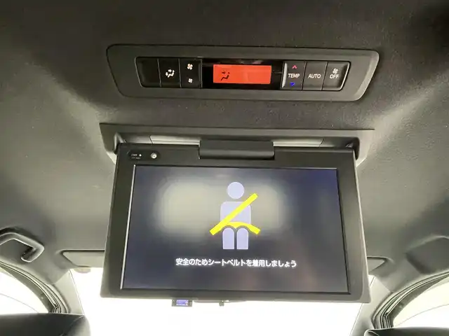 トヨタ ヴォクシー ZS 煌Ⅲ 熊本県 2021(令3)年 5.5万km ブラック 禁煙車　/純正１０インチナビNSZT-Z68T　/純正前後ドライブレコーダー　/バックカメラ/ビルトインＥＴＣ　/純正12.1インチフリップダウンモニター　/両側パワースライドドア　/トヨタセーフティーセンス/・プリクラッシュセーフティ/・レーンディパーチャーアラート/・クルーズコントロール/・オートマチックハイビーム/・先行車発進お知らせ機能/・インテリジェントクリアランスソナー/横滑り防止/アイドリングストップ/ハーフレザーシート/純正フロアマット/オートライト/LEDヘッドライト/フォグライト/スマートキー/プッシュスタート