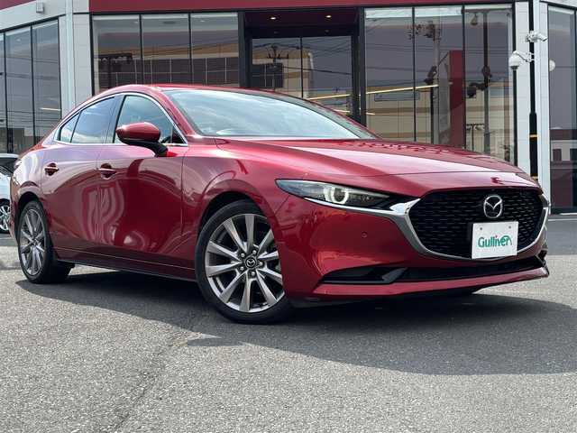 マツダ マツダ３セダン XD Lパッケージ 宮城県 2019(令1)年 5.3万km ソウルレッドクリスタルM 登録時走行距離５２５１２ｋｍ/全方位カメラ/レーダークルーズコントロール/ＢＯＳＥ　プレミアムサウンド/純正ナビ/・フルセグ/・BT/・CD/DVD/・ＡＭ/FM/・USB/HDMI/レーンキープアシスト/スマートブレーキサポート/BSM/Aライト/Aハイビーム/クリアランスソナー/横滑り防止機能/i-stop/電動パーキング/ＡＵＴＯホールド/パワーシート/シートヒーター/パドルシフト/ステアリングスイッチ/スマートキー/プッシュスタート/LEDヘッドライト/ウインカーミラー