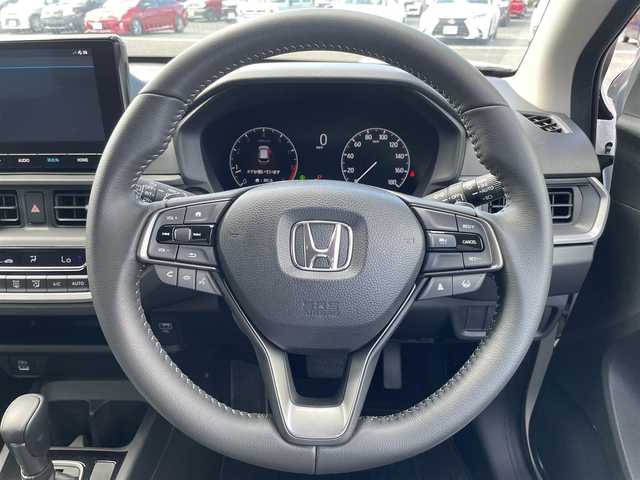 ホンダ ＷＲ－Ｖ Z+ 熊本県 2024(令6)年 0.5万km プラチナホワイトパール 純正ナビ/・AM/FM/BT/USB/・フルセグTV/・バックカメラ/ホンダセンシング/・衝突軽減ブレーキ/・先行車発進お知らせ/・路外逸脱抑制機能/・アダプティブクルーズコントロール/・車線維持支援システム/・踏み間違い防止装置/・先行車発進お知らせ/・標識認識機能/・オートハイビーム/ハーフレザーシート/ETC/前後ドライブレコーダー/革巻きステアリング/ステアリングスイッチ/パドルシフト/ルーフレール/純正フロアマット/電動格納ミラー/ウインカーミラー/フォグランプ/ドアバイザー/プッシュスタート