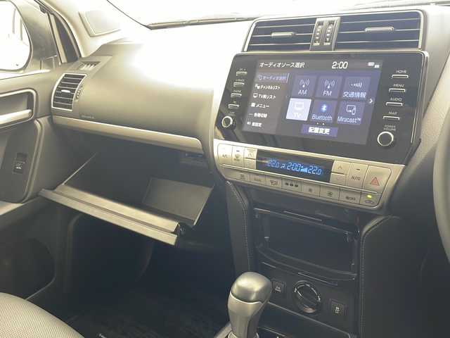 トヨタ ランドクルーザー プラド TX Lパッケージ ブラックED 沖縄県 2021(令3)年 4.7万km ホワイトパールクリスタルシャイン 純正９インチナビ/（フルセグTV　Bluetooth　FM　AM）/サンルーフ/全方位カメラ/黒革パワーシート/エアーシート/シートヒーター/前後コーナーセンサー/前方ドライブレコーダー（ND-DVR30）/ＬＥＤヘッドライト/純正１８インチアルミホイール/ルーフレール/JAOSフロントスキッドバー/リフトアップ/オーバーフェンダー