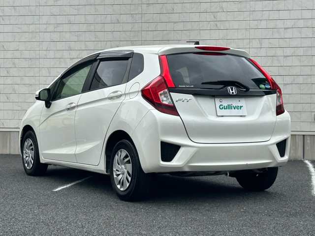 ホンダ フィット 13G Lパッケージ 千葉県 2014(平26)年 2.9万km プレミアムホワイトパール 純正メモリナビ（VXM-145VFi）/BlueTooth接続/CD/DVD/フルセグテレビ/バックカメラ/LEDヘッドライト/エンジンスタートボタン/アイドリングストップ/ETC/オートエアコン/電動格納ミラー/スマートキー/スペアキー/ドアバイザー/純正フロアマット/取扱説明書/保証書