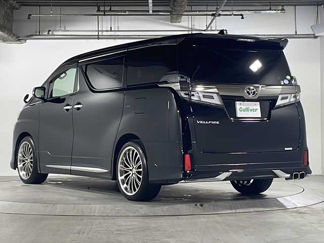 トヨタ ヴェルファイア Z 広島県 2018(平30)年 5.9万km ブラック 禁煙/モデリスタエアロ（F/S/R）/トヨタセーフティセンス/・プリクラッシュセーフティ/・レーダークルーズコントロール/・オートマチックハイビーム/・LTA/LDA/RSA/・先行車発進告知/クリアランスソナー/純正10型ナビ（NSZN-Z66T）/・CD/DVD/DTV/Bluetooth/SD/REC/純正フリップダウンモニター（V12T-R66C）/バックカメラ/両側パワースライドドア/ウッドコンビステアリング/ステアリングスイッチ/オートライト/LEDヘッドライト/フォグランプ/電動パーキング/ブレーキホールド/前後ドライブレコーダー（DRV-MR745）/ビルトインETC2.0/プッシュスタート/スマートキー/スペアキー/純正フロアマット/純正ドアバイザー/社外20インチアルミホイール（245/40ZR20）