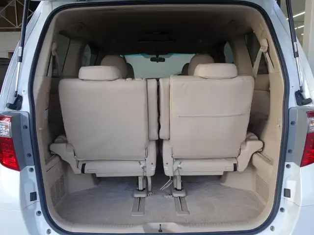 トヨタ アルファード 240S リミテッド 静岡県 2010(平22)年 8.2万km ホワイトパールクリスタルシャイン ワンオーナー／禁煙車/車検R9年3月23日/純正16.2インチワイドフリップダウンモニター/純正ディーラー7インチHDDナビ/　CD/DVD/SD/BT/BT/AUX/フルセグTV/バックカメラ/ビルトインETC/両側パワースライドドア/リアオートエアコン/クリアランスソナー／バックソナー/スマートキー／プッシュスタート/HIDヘッドライト／オートライト/純正フロアマット/純正ドアバイザー/保証書