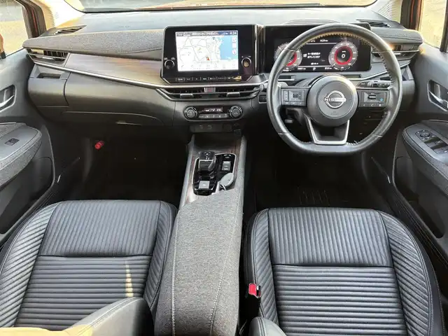 日産 オーラ G レザーエディション 福岡県 2022(令4)年 5.9万km プレミアムコロナオレンジ プロパイロット/BOSEサウンドシステム/純正ナビ（BT/フルセグ/AM/FM/HDMI)/アラウンドビューモニター/Bカメラ/フロントカメラ/サイドカメラ/レーダークルーズコントロール/LEDヘッドライト/オートマチックハイビーム/オートライト/レザーシート/純正17インチAW/ステアリングスイッチ/AutoHold/横滑り防止装置/コーナーセンサー/盗難防止装置/衝突被害軽減システム/保証書/スマートキー/ETC2.0