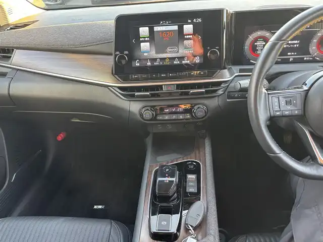 日産 オーラ G レザーエディション 福岡県 2022(令4)年 5.9万km プレミアムコロナオレンジ プロパイロット/BOSEサウンドシステム/純正ナビ（BT/フルセグ/AM/FM/HDMI)/アラウンドビューモニター/Bカメラ/フロントカメラ/サイドカメラ/レーダークルーズコントロール/LEDヘッドライト/オートマチックハイビーム/オートライト/レザーシート/純正17インチAW/ステアリングスイッチ/AutoHold/横滑り防止装置/コーナーセンサー/盗難防止装置/衝突被害軽減システム/保証書/スマートキー/ETC2.0