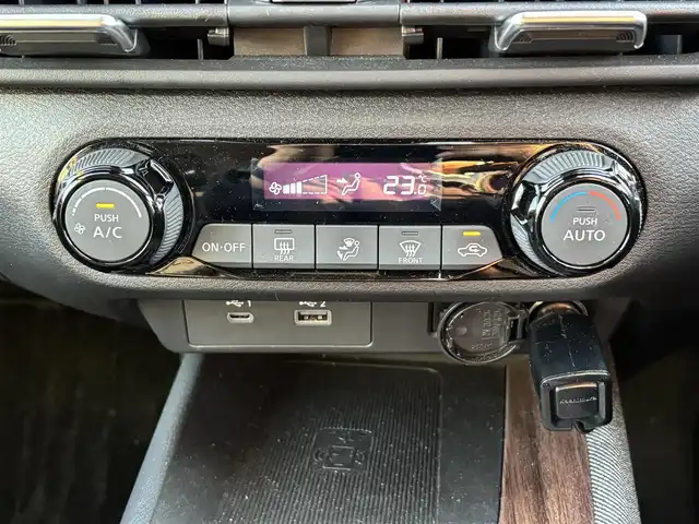 日産 オーラ G レザーエディション 福岡県 2022(令4)年 5.9万km プレミアムコロナオレンジ プロパイロット/BOSEサウンドシステム/純正ナビ（BT/フルセグ/AM/FM/HDMI)/アラウンドビューモニター/Bカメラ/フロントカメラ/サイドカメラ/レーダークルーズコントロール/LEDヘッドライト/オートマチックハイビーム/オートライト/レザーシート/純正17インチAW/ステアリングスイッチ/AutoHold/横滑り防止装置/コーナーセンサー/盗難防止装置/衝突被害軽減システム/保証書/スマートキー/ETC2.0