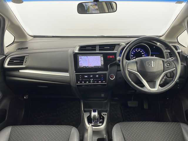 ホンダ フィット ハイブリット Lパッケージ 栃木県 2015(平27)年 4.7万km プレミアムホワイトパール 純正ナビ/　CD/FM/AM/SD/Fパッケージ/Lパッケージ/クルーズコントロール/ETC/LEDヘッドライト/革巻きステアリング/オートライト/電動格納ミラー/オートエアコン/プッシュスタート/横滑り防止装置/フロアマット