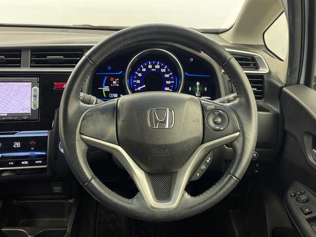 ホンダ フィット ハイブリット Lパッケージ 栃木県 2015(平27)年 4.7万km プレミアムホワイトパール 純正ナビ/　CD/FM/AM/SD/Fパッケージ/Lパッケージ/クルーズコントロール/ETC/LEDヘッドライト/革巻きステアリング/オートライト/電動格納ミラー/オートエアコン/プッシュスタート/横滑り防止装置/フロアマット