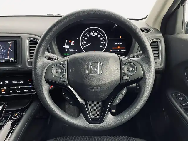 ホンダ ヴェゼル ハイブリッド ホンダセンシング 道央・札幌 2019(平31)年 4.3万km ミッドナイトブルービームM ・４WD/・寒冷地仕様/・社外メモリナビ/・CD/DVD/AUX/・バックカメラ/・ホンダセンシング/・クリアランスソナー/・オートホールドブレーキ/・パドルシフト/・レーンキープアシスト/・横滑り防止装置/・LEDヘッドライト/・オートライト/・プッシュスタート/・スマートキー/・スペアキー/・純正フロアマット/・純正16インチAW/・ドアバイザー/・取扱説明書