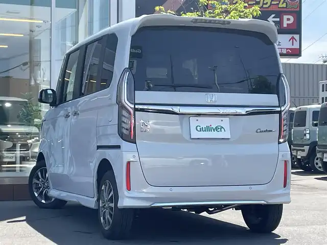 ホンダ Ｎ ＢＯＸ カスタム L 道央・札幌 2022(令4)年 1.4万km プレミアムサンライトホワイトパール ・４WD/・ワンオーナー/・ホンダセンシング/・両側パワースライドドア/・社外ナビ/　CD＆DVD＆BT＆TV/・バックカメラ/・コーナーセンサー/・レーンキープアシスト/・レーダークルーズコントロール/・純正エンジンスターター/・前後ドライブレコーダー/・オートエアコン/・オートライト/・ミラーヒーター/・シートヒーター/・電動格納ミラー/・プッシュスタート/・スマートキー/・ステアリングスイッチ/・純正フロアマット/・ウィンカーミラー/・フォグライト