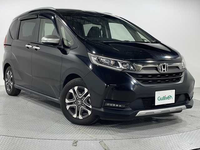 ホンダ フリード クロスター ホンダセンシング 広島県 2020(令2)年 6.6万km クリスタルブラックパール 純正9型ナビ/両側パワースライドドア/バックカメラ/シートヒーター/ハーフレザーシート/ホンダセンシング/・衝突軽減ブレーキ/・レーンキープアシスト/・アダプティブクルーズコントロール/・誤発進抑制機能/LEDヘッドランプ/純正15インチAW/ETC/ドライブレコーダー
