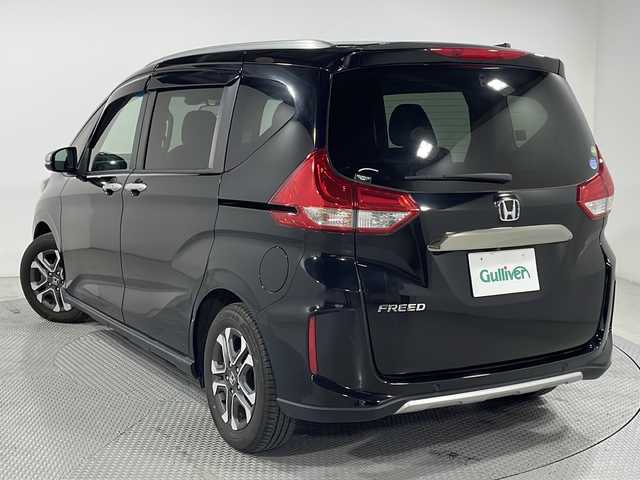 ホンダ フリード クロスター ホンダセンシング 広島県 2020(令2)年 6.6万km クリスタルブラックパール 純正9型ナビ/両側パワースライドドア/バックカメラ/シートヒーター/ハーフレザーシート/ホンダセンシング/・衝突軽減ブレーキ/・レーンキープアシスト/・アダプティブクルーズコントロール/・誤発進抑制機能/LEDヘッドランプ/純正15インチAW/ETC/ドライブレコーダー