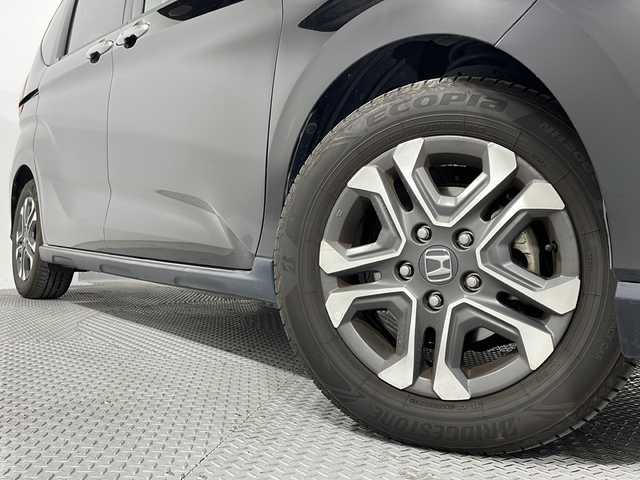 ホンダ フリード クロスター ホンダセンシング 広島県 2020(令2)年 6.6万km クリスタルブラックパール 純正9型ナビ/両側パワースライドドア/バックカメラ/シートヒーター/ハーフレザーシート/ホンダセンシング/・衝突軽減ブレーキ/・レーンキープアシスト/・アダプティブクルーズコントロール/・誤発進抑制機能/LEDヘッドランプ/純正15インチAW/ETC/ドライブレコーダー