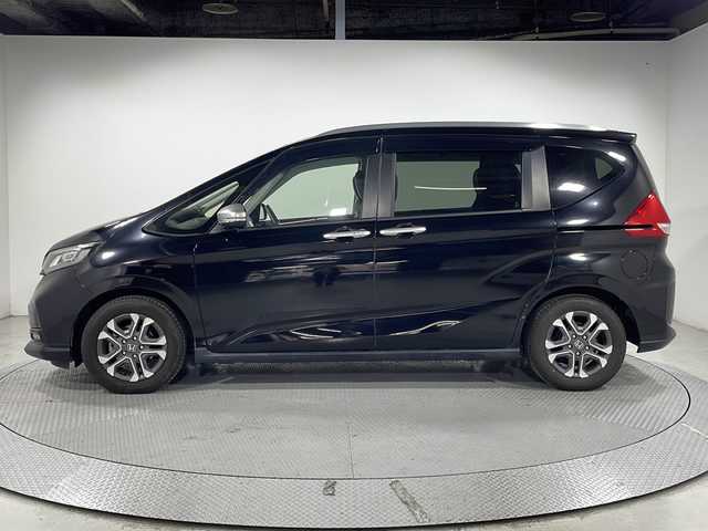ホンダ フリード クロスター ホンダセンシング 広島県 2020(令2)年 6.6万km クリスタルブラックパール 純正9型ナビ/両側パワースライドドア/バックカメラ/シートヒーター/ハーフレザーシート/ホンダセンシング/・衝突軽減ブレーキ/・レーンキープアシスト/・アダプティブクルーズコントロール/・誤発進抑制機能/LEDヘッドランプ/純正15インチAW/ETC/ドライブレコーダー