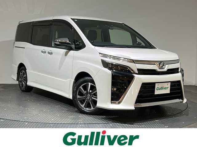 トヨタ ヴォクシー ZS 煌Ⅱ 愛媛県 2019(令1)年 3.9万km ホワイトパールクリスタルシャイン ワンオーナー/純正10型ナビ/(Bluetooth/フルセグ/HDMI)/バックカメラ/クルーズコントロール/フリップダウンモニター/前後ドライブレコーダー/両側電動スライド/衝突被害軽減ブレーキ/コーナーセンサー/レーンキープアシスト/オートマチックハイビーム/オートライト/フォグランプ/ドアバイザー/ステアリングスイッチ/サイドサンシェード/エンジンスターター/ECOモード/保証書