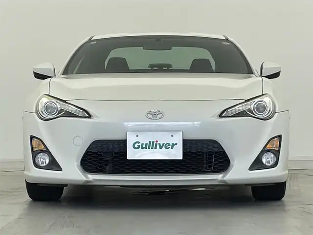 トヨタ ８６ GT 群馬県 2016(平28)年 3.9万km クリスタルホワイトパール 純正7インチSDナビ/(フルセグTV/BT/CD/DVD/SD/AM/FM)/クルーズコントロール/バックカメラ/パドルシフト/HIDヘッドライト/オートライト/プッシュスタート/スマートキー/革巻きステアリング/純正フロアマット/純正アルミホイール/W＋サイド＋カーテンエアバッグ