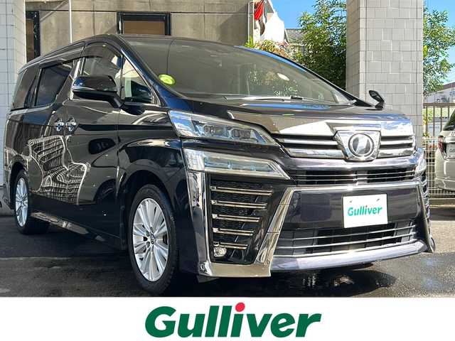 トヨタ ヴェルファイア Z 京都府 2018(平30)年 8.1万km スパークリングブラックパールクリスタルシャイン 純正９インチナビ　/　NSZT-Y68T/HDMI/SD/USB/DVD/CD/AM/FM/Bluetooth/バックカメラ/フルセグＴＶ/（走行視聴可）/両側電動スライドドア/純正１２．１インチフリップダウンモニター/（V12T-R58C）　/前後コーナーセンサー/レーダークルーズコントロール　/ＬＥＤヘッドライト/オートマチックハイビーム/オートライト/社外シートカバー/3列シート/オットマン/前純正ドライブレコーダー/レーンキープアシスト/ロードサインアシスト/純正フロアマット/サイドバイザー/保証書/整備記録簿/取扱説明書