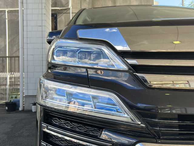 トヨタ ヴェルファイア Z 京都府 2018(平30)年 8.1万km スパークリングブラックパールクリスタルシャイン 純正９インチナビ　/　NSZT-Y68T/HDMI/SD/USB/DVD/CD/AM/FM/Bluetooth/バックカメラ/フルセグＴＶ/（走行視聴可）/両側電動スライドドア/純正１２．１インチフリップダウンモニター/（V12T-R58C）　/前後コーナーセンサー/レーダークルーズコントロール　/ＬＥＤヘッドライト/オートマチックハイビーム/オートライト/社外シートカバー/3列シート/オットマン/前純正ドライブレコーダー/レーンキープアシスト/ロードサインアシスト/純正フロアマット/サイドバイザー/保証書/整備記録簿/取扱説明書