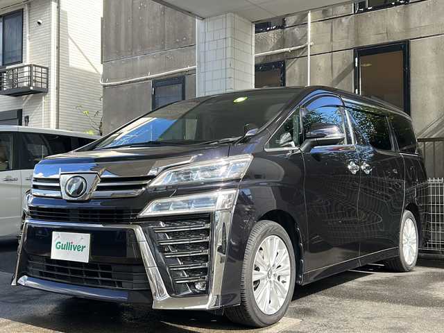 トヨタ ヴェルファイア Z 京都府 2018(平30)年 8.1万km スパークリングブラックパールクリスタルシャイン 純正９インチナビ　/　NSZT-Y68T/HDMI/SD/USB/DVD/CD/AM/FM/Bluetooth/バックカメラ/フルセグＴＶ/（走行視聴可）/両側電動スライドドア/純正１２．１インチフリップダウンモニター/（V12T-R58C）　/前後コーナーセンサー/レーダークルーズコントロール　/ＬＥＤヘッドライト/オートマチックハイビーム/オートライト/社外シートカバー/3列シート/オットマン/前純正ドライブレコーダー/レーンキープアシスト/ロードサインアシスト/純正フロアマット/サイドバイザー/保証書/整備記録簿/取扱説明書