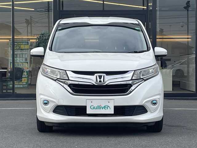 ホンダ フリード ハイブリット G ホンダセンシング 茨城県 2016(平28)年 14万km ホワイトオーキッドパール 純正ナビ/バックカメラ/両側パワースライド/ホンダセンシング/ウォークスルー/スペアキー1本/レーンキープアシスト/盗難防止装置/横滑り防止装置/純正LED/ETC