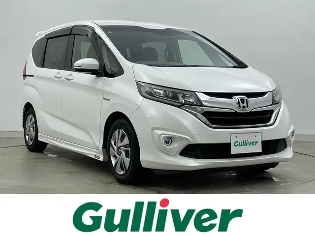 ホンダ フリード ハイブリット G 岡山県 2016(平28)年 14万km ホワイトオーキッドパール 純正ナビ/・FM/AM/Bluetooth/フルセグ/CD/DVD/バックカメラ/両側パワースライド/ETC/社外ドライブレコーダー（前後）/クルーズコントロール/スペアキー1本/盗難防止装置/横滑り防止装置/純正LEDヘッドライト/・オートライト/・フォグライト/純正フロアマット