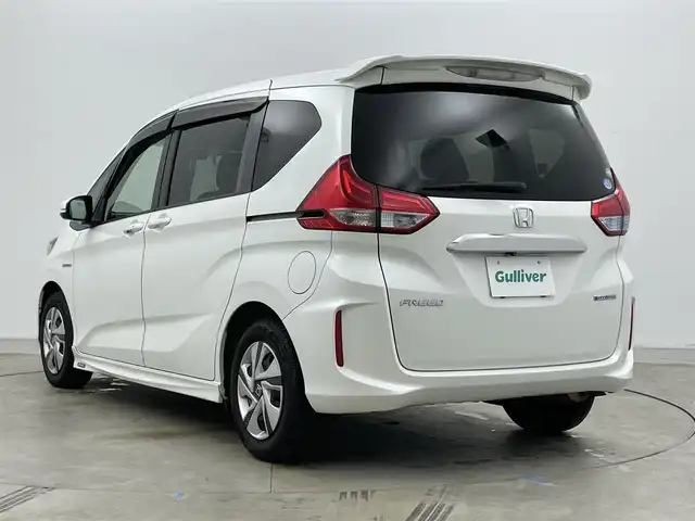 ホンダ フリード ハイブリット G 岡山県 2016(平28)年 14万km ホワイトオーキッドパール 純正ナビ/・FM/AM/Bluetooth/フルセグ/CD/DVD/バックカメラ/両側パワースライド/ETC/社外ドライブレコーダー（前後）/クルーズコントロール/スペアキー1本/盗難防止装置/横滑り防止装置/純正LEDヘッドライト/・オートライト/・フォグライト/純正フロアマット